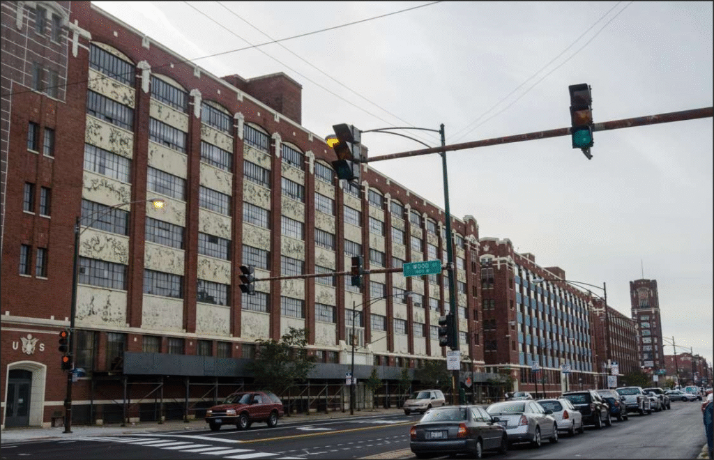 Looking westward along Pershing Road towards the CMD Clock Tower building. Central Manufacturing District – Pershing Road © Eric Allix Rogers