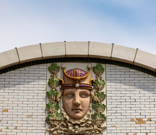 LOSS: Decorative Terra Cotta Ornament Stripped from New Devon Theater / Assyrian American Association