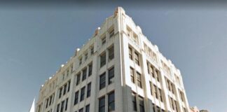 THREATENED: Temptation Chocolates Building Risks Removal of Exterior Terra Cotta!
