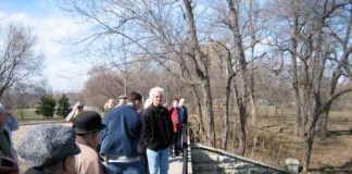 Annual Clarence Darrow Bridge Flower-Tossing Ceremony March 13, 2024