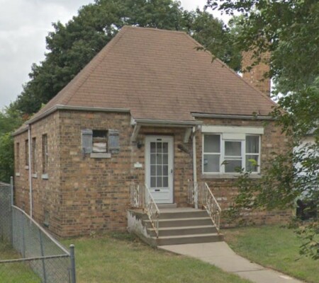 10627 S. May Street, c.1925, Washington Heights. A brick cottage with a steep hipped roof, corbelled brick chimney and a raised entry. Emergency demolition, August 2026. Photo credit: Google Maps